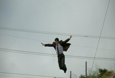 Late for work, Clark Kent forgets to put on his Superman outfit before flying to the Daily Planet.