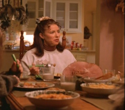 holy Shmolee! Theres only four people at the table! whats with the big freakin' ham, Mimi? Why kill a whole boar to feed four friggin' mofos?